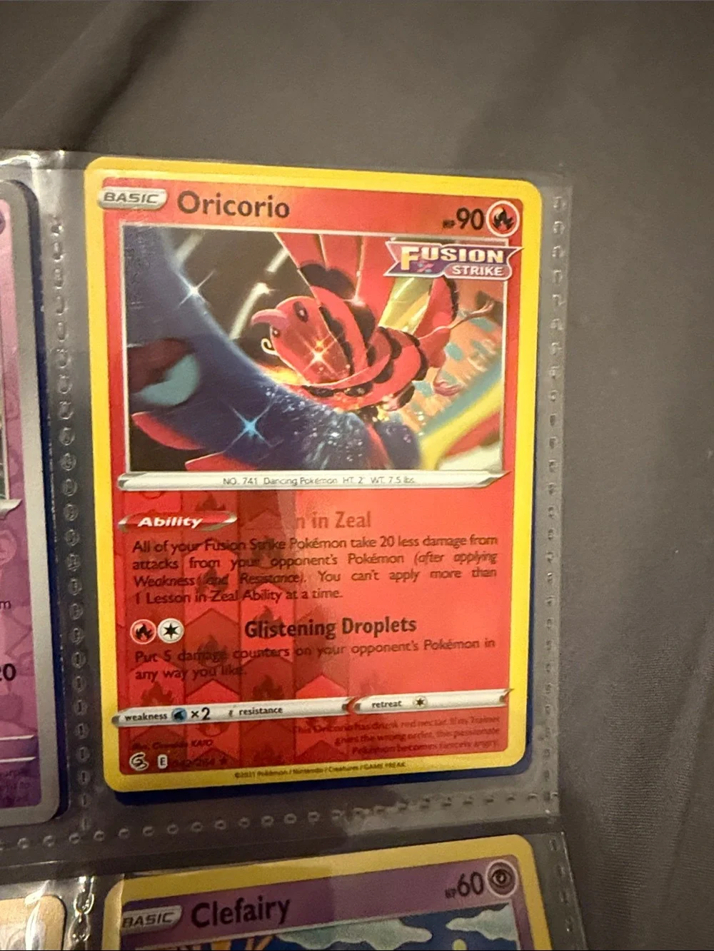 Rare Pokemon Oricorio Trading Card - Red and Yellow reverse. Fusion strike